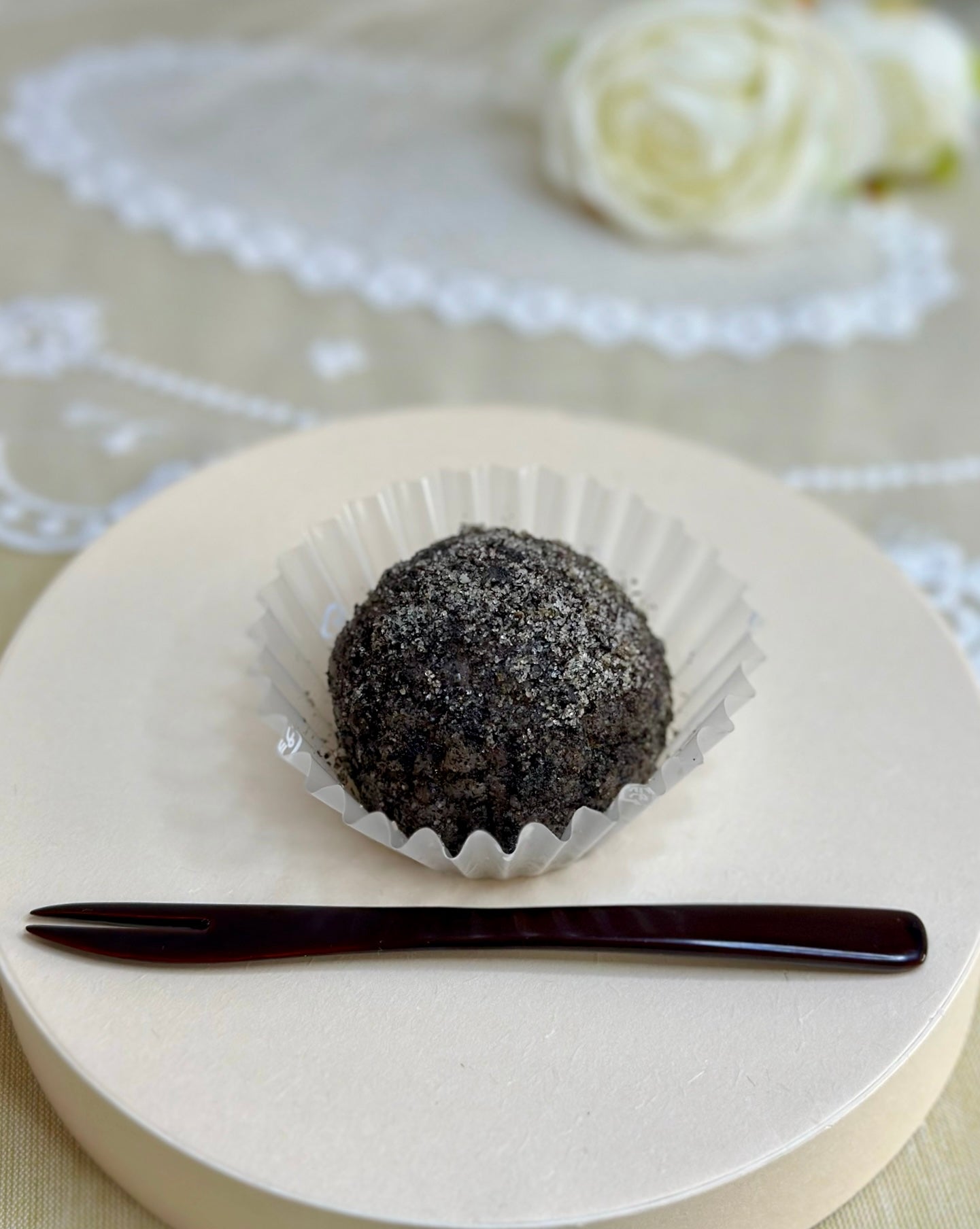 Ohagi product black sesame outside and red bean paste inside